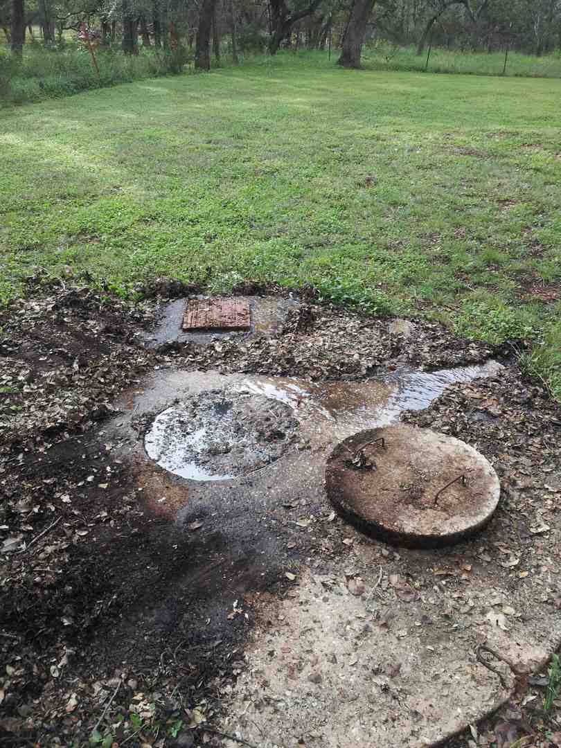 Septic tank lids overflowing and backing up